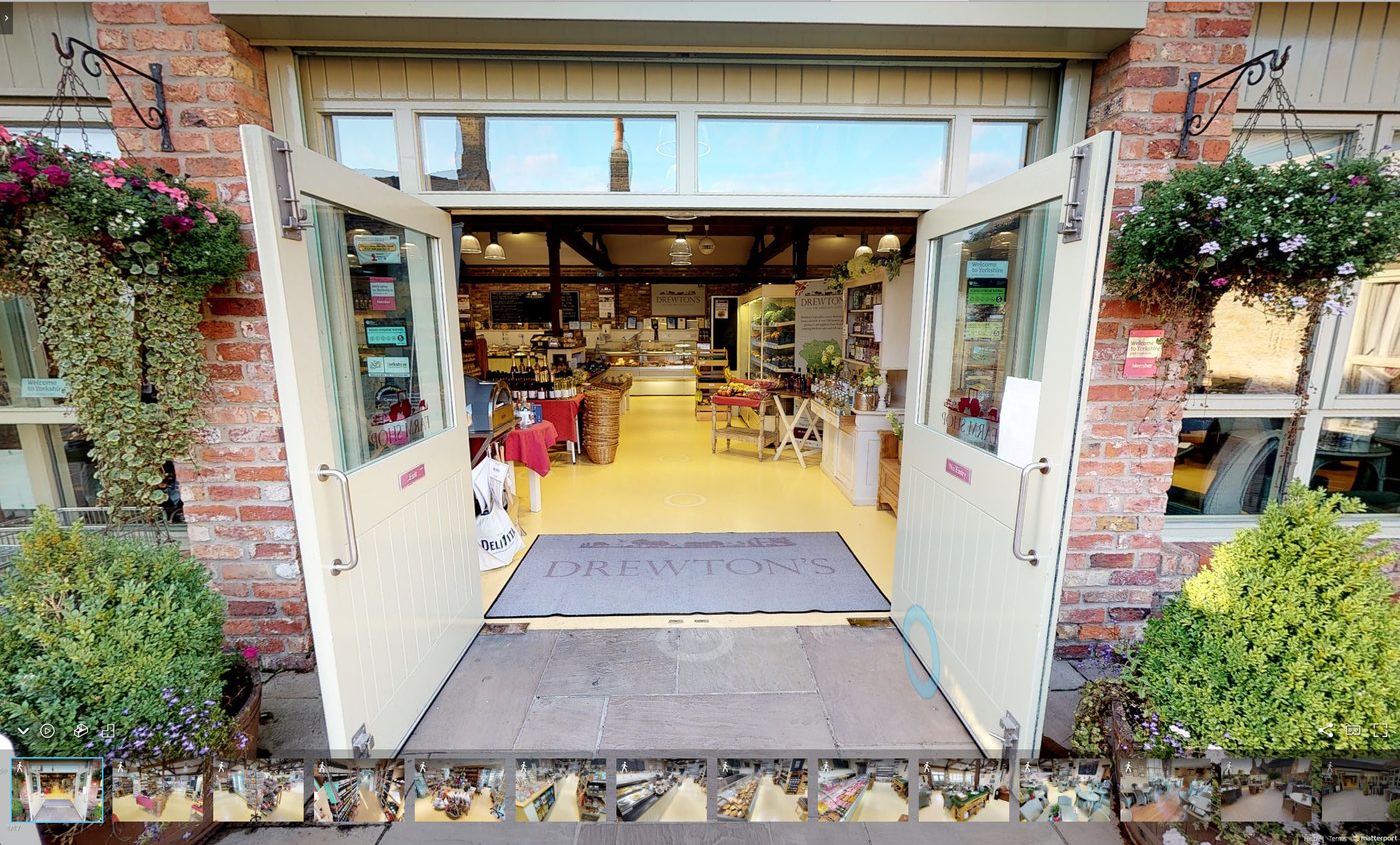 The Drewton's farm-shop shopfront on The Drewton Estate, brick courtyard and double doors